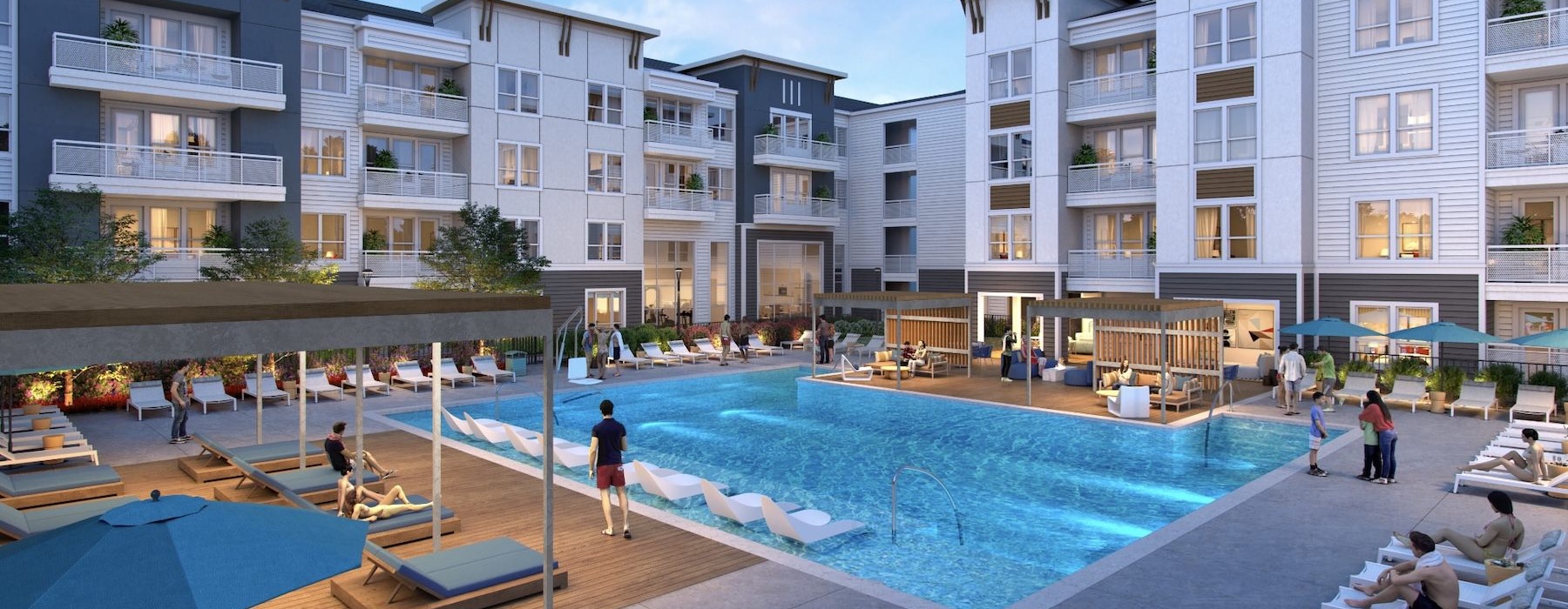 a swimming pool in a courtyard with people and lounge chairs